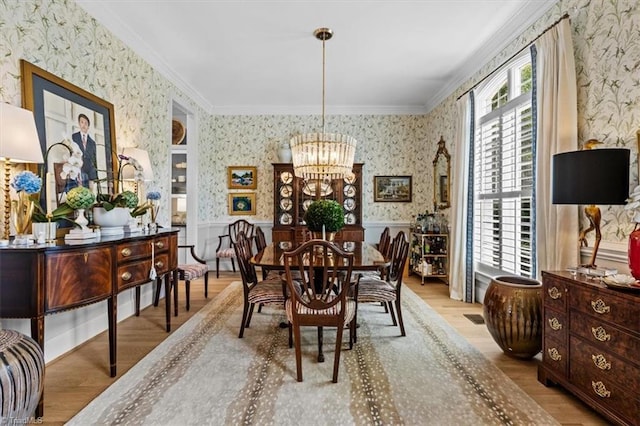 2550 Mountain Lake Rd, Asheboro, NC 27205 - dining space featuring wallpapered walls, a chandelier, a wainscoted wall, ornamental molding, and wood finished floors