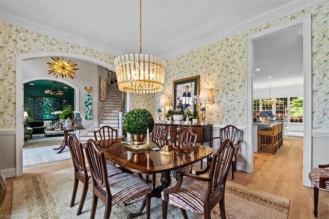 2550 Mountain Lake Rd, Asheboro, NC 27205 - dining room with wallpapered walls, a chandelier, a wainscoted wall, wood finished floors, and stairs
