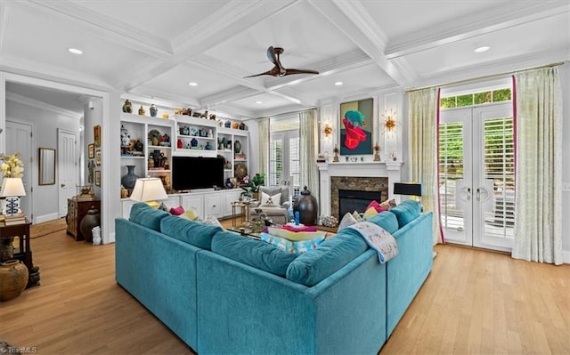 2550 Mountain Lake Rd, Asheboro, NC 27205 - living area featuring french doors, crown molding, light wood-type flooring, a fireplace, and coffered ceiling