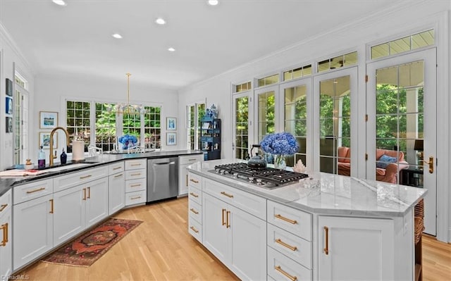 2550 Mountain Lake Rd, Asheboro, NC 27205 - kitchen with stainless steel appliances, ornamental molding, white cabinets, light wood-type flooring, and recessed lighting