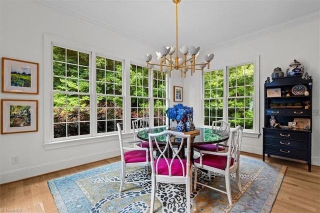 2550 Mountain Lake Rd, Asheboro, NC 27205 - dining space featuring a chandelier, crown molding, and wood finished floors