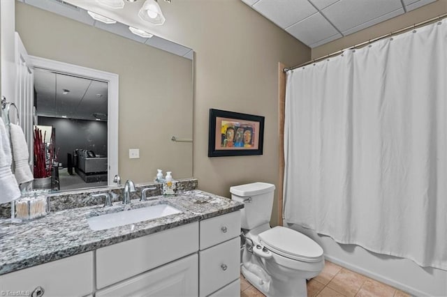 2550 Mountain Lake Rd, Asheboro, NC 27205 - full bathroom featuring vanity, tile patterned floors, shower / bath combination with curtain, and a paneled ceiling