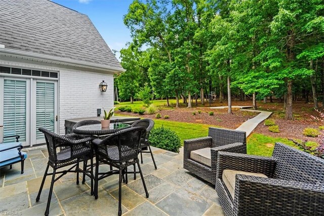 2550 Mountain Lake Rd, Asheboro, NC 27205 - view of patio with outdoor dining area and view of scattered trees