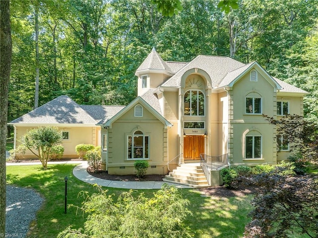 view of front of house with a front yard