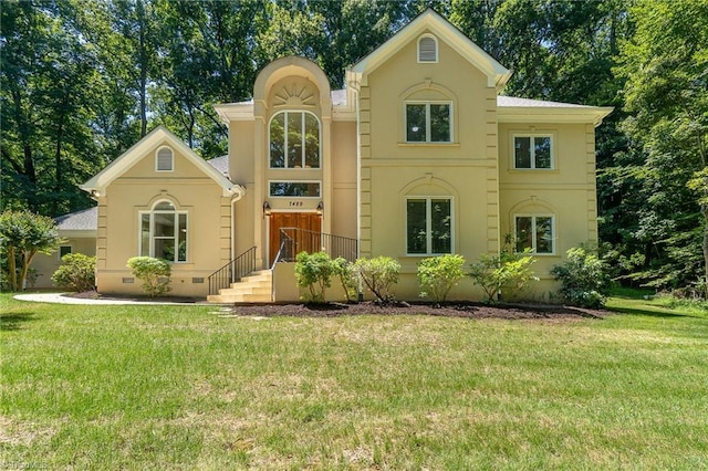 view of front of home featuring a front yard