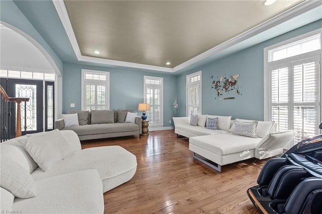 8501 Julina Dr, Oak Ridge, NC 27310 - living room with arched walkways, plenty of natural light, crown molding, wood finished floors, and recessed lighting