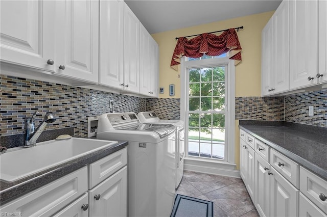 8501 Julina Dr, Oak Ridge, NC 27310 - washroom with cabinet space, washing machine and dryer, and light tile patterned floors