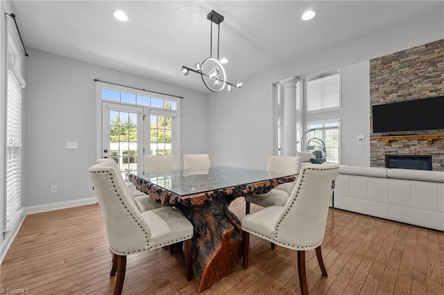 8501 Julina Dr, Oak Ridge, NC 27310 - dining room with light wood-style floors, plenty of natural light, a chandelier, and recessed lighting