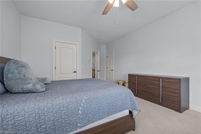 8501 Julina Dr, Oak Ridge, NC 27310 - carpeted bedroom featuring ceiling fan and baseboards