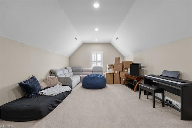 8501 Julina Dr, Oak Ridge, NC 27310 - carpeted living area featuring lofted ceiling and recessed lighting