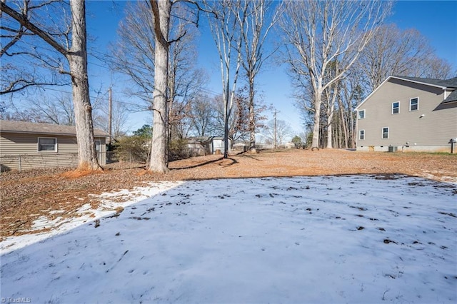 view of yard covered in snow