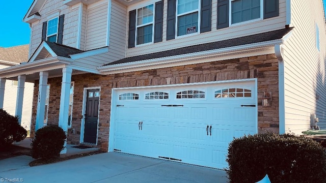 exterior space with a garage