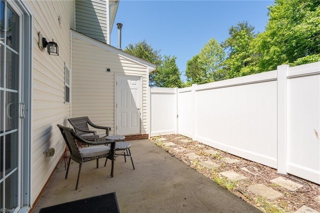 view of patio with a fenced backyard