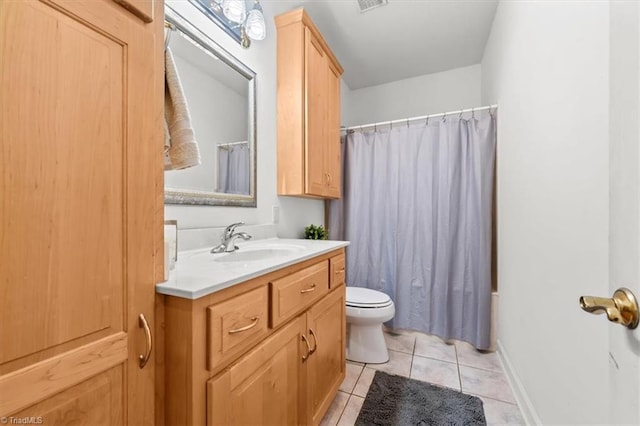 full bathroom with baseboards, toilet, tile patterned flooring, and vanity