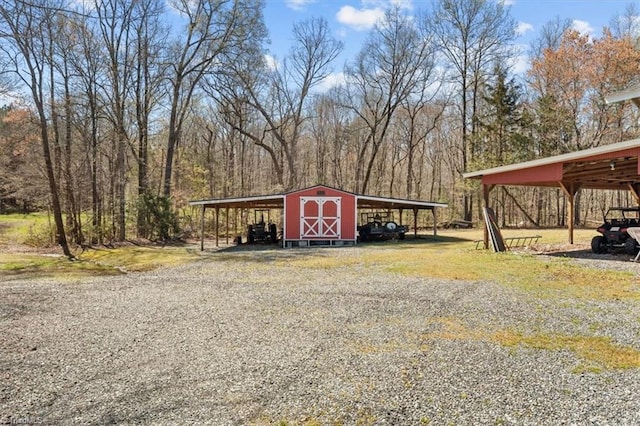 view of outbuilding with an outdoor structure and a carport