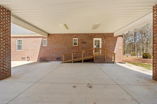 view of patio / terrace with an attached carport