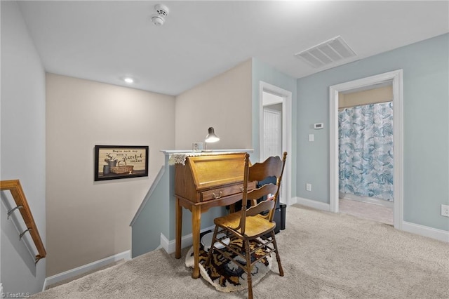 office area with carpet, visible vents, and baseboards