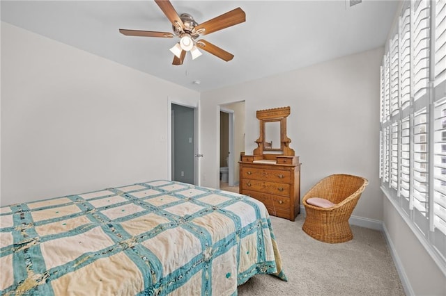 bedroom with carpet flooring, baseboards, and ceiling fan