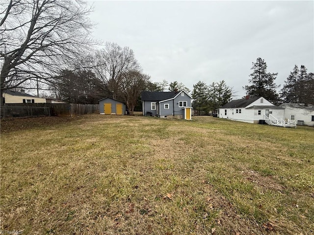 view of yard with a storage shed