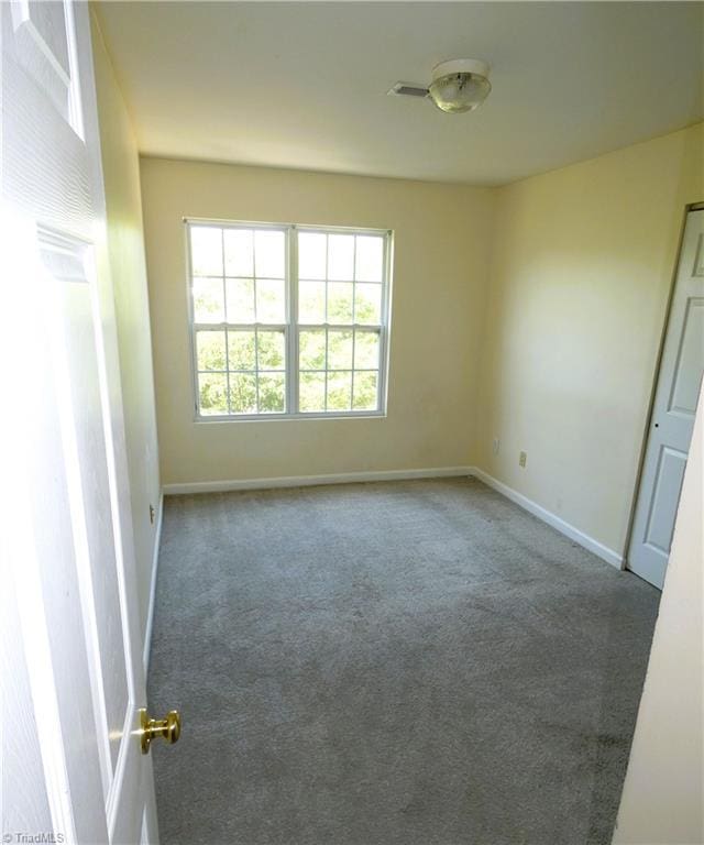 3035 Canterbury Park Dr, Winston-Salem, NC 27127 - unfurnished room featuring carpet and baseboards