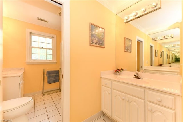 bathroom featuring tile patterned floors, visible vents, vanity, and crown molding