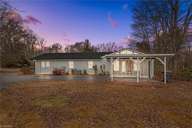 view of front of home featuring central AC unit