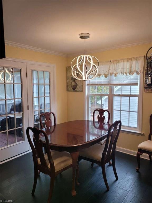 5125 Old Plantation Cir, Winston-Salem, NC 27104 - dining area featuring a chandelier, crown molding, dark wood-style flooring, and baseboards