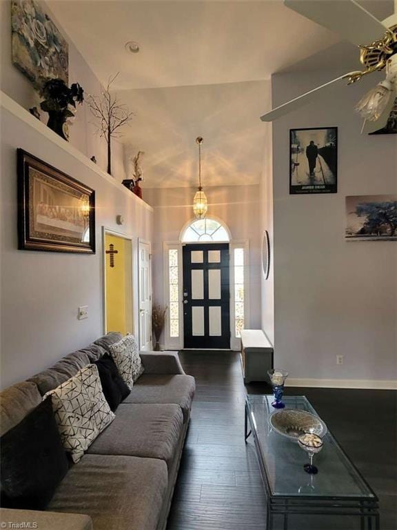 5125 Old Plantation Cir, Winston-Salem, NC 27104 - living room with dark wood-style floors, high vaulted ceiling, and baseboards