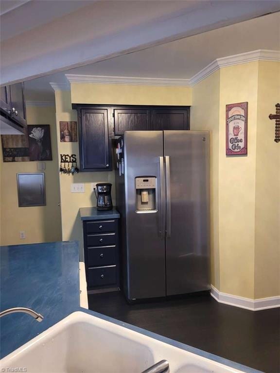 5125 Old Plantation Cir, Winston-Salem, NC 27104 - kitchen with stainless steel refrigerator with ice dispenser, ornamental molding, and baseboards