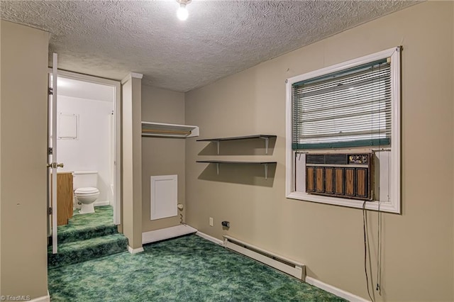 210 W Parkway Ave, High Point, NC 27284 - washroom with baseboard heating, a textured ceiling, carpet floors, and baseboards