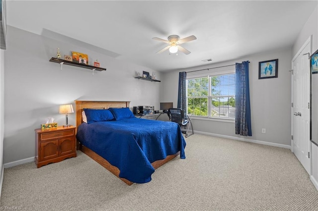 bedroom featuring baseboards, carpet, and visible vents