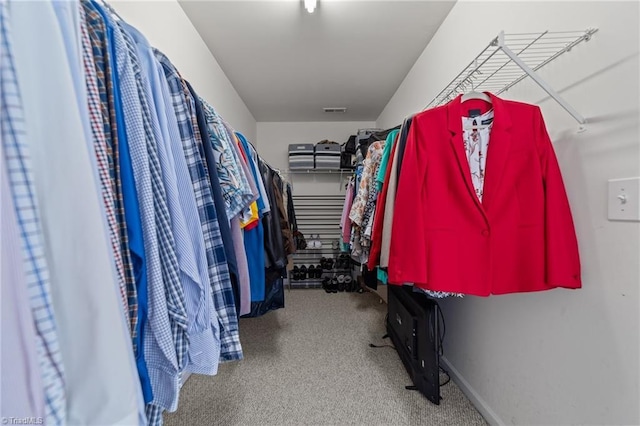 spacious closet with carpet and visible vents