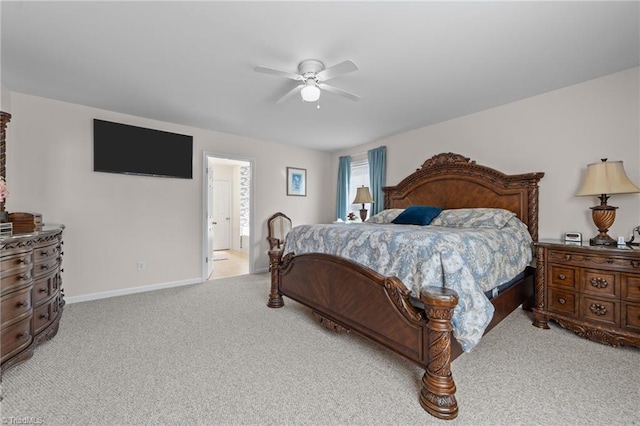 bedroom with light colored carpet, a ceiling fan, and baseboards