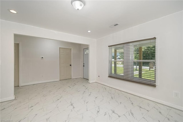 304 Ingram St, Thomasville, NC 27360 - empty room with recessed lighting and light marble finish flooring