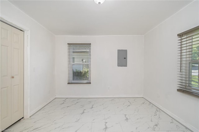 304 Ingram St, Thomasville, NC 27360 - unfurnished bedroom featuring electric panel and light marble finish floors
