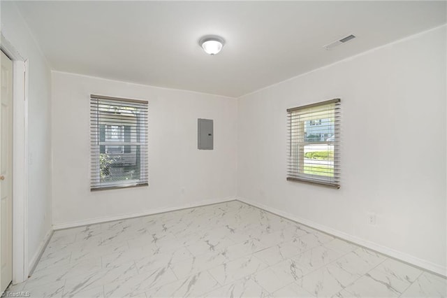 304 Ingram St, Thomasville, NC 27360 - spare room with marble look tiles and healthy amount of natural light
