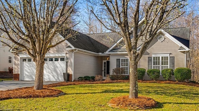 single story home featuring a front lawn, an attached garage, and driveway