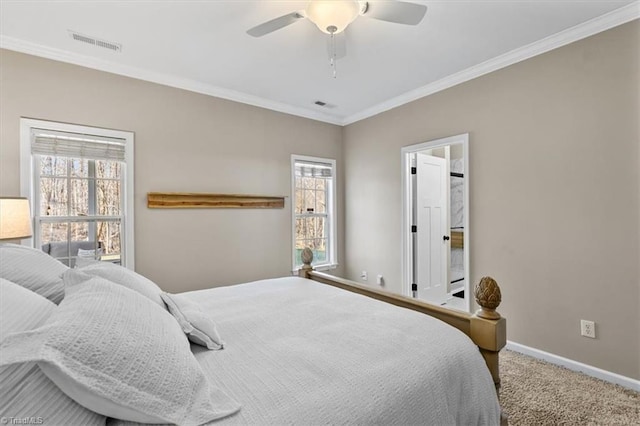 carpeted bedroom with ceiling fan, visible vents, baseboards, and ornamental molding