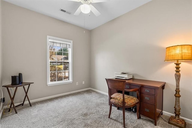 home office with carpet flooring, visible vents, baseboards, and ceiling fan