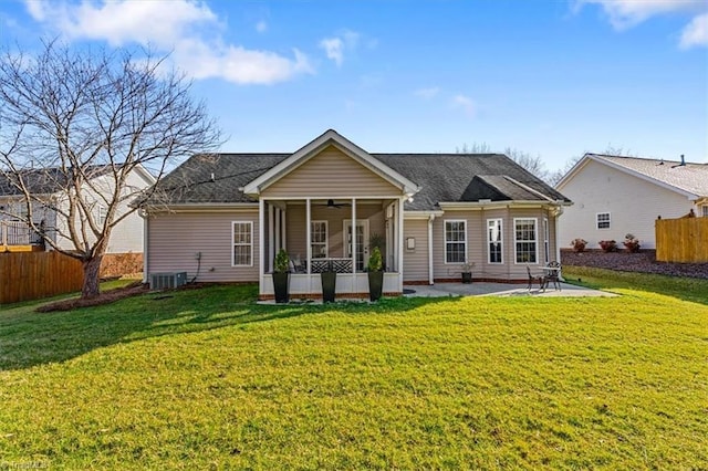 back of house with ceiling fan, fence, a patio, and a sunroom