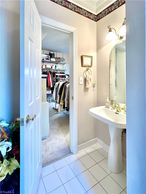 bathroom featuring tile patterned flooring