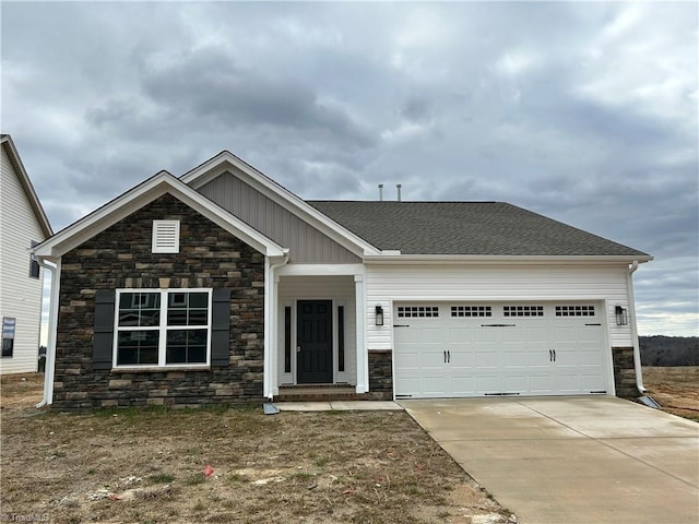 craftsman-style house featuring a garage