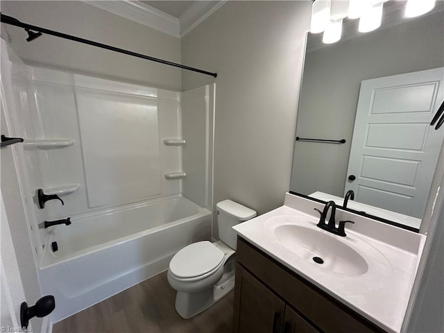 full bathroom with bathing tub / shower combination, hardwood / wood-style floors, vanity, ornamental molding, and toilet