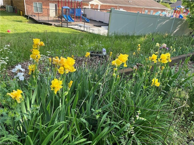 details with central air condition unit and fence