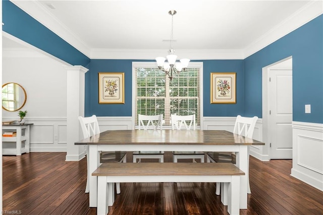 301 Summerwalk Rd, Greensboro, NC 27455 - dining space featuring a chandelier, a decorative wall, hardwood / wood-style floors, a wainscoted wall, and ornamental molding