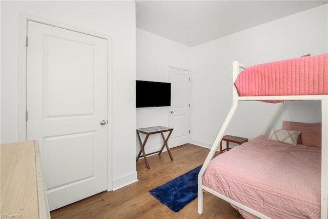301 Summerwalk Rd, Greensboro, NC 27455 - bedroom featuring wood finished floors and baseboards