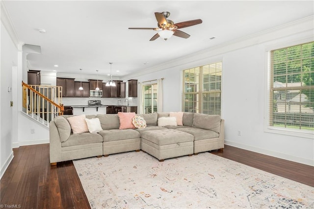 301 Summerwalk Rd, Greensboro, NC 27455 - living area featuring dark wood finished floors, crown molding, a ceiling fan, stairway, and recessed lighting