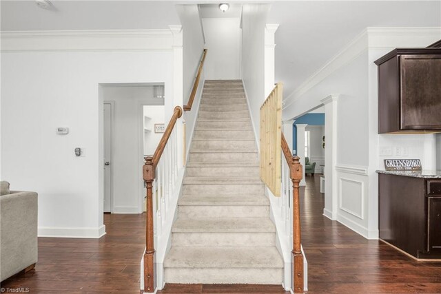 301 Summerwalk Rd, Greensboro, NC 27455 - staircase featuring hardwood / wood-style flooring and crown molding