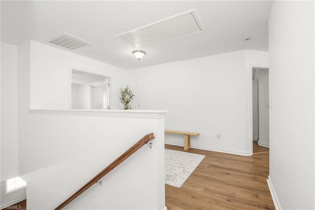 301 Summerwalk Rd, Greensboro, NC 27455 - corridor featuring an upstairs landing, light wood-type flooring, and attic access