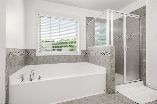 301 Summerwalk Rd, Greensboro, NC 27455 - bathroom with a garden tub, a shower stall, and tile patterned flooring